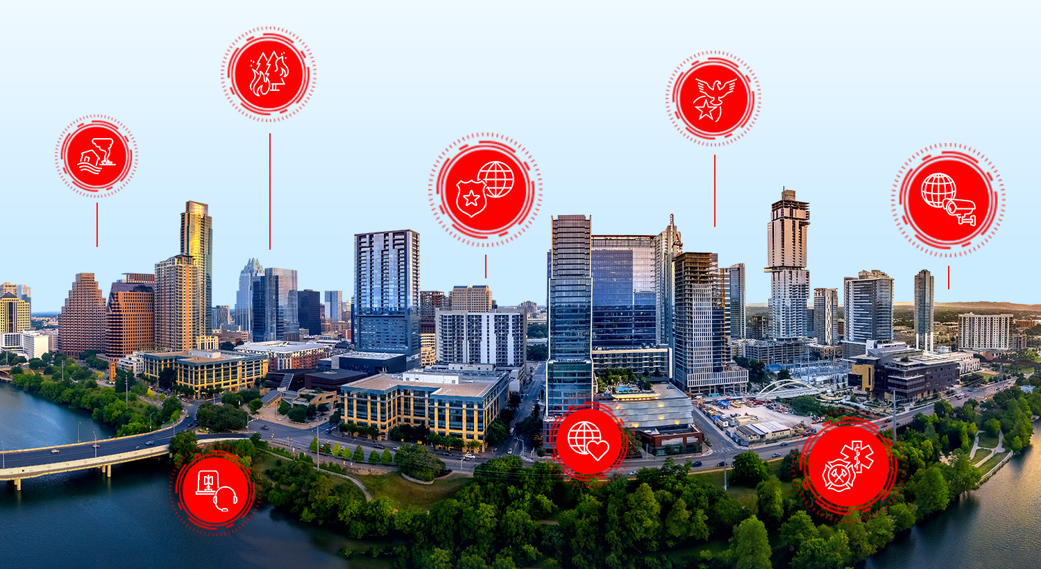 Vue panoramique d’une ville construite en front de mer avec des icônes rouges de sécurité publique indiquant les incendies, les tornades, les services de police, de santé, et bien plus encore