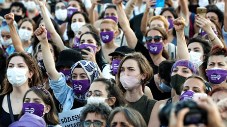 Group of young women with face masks on