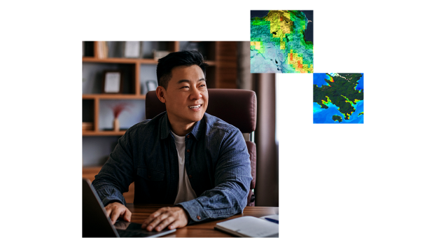 A young man in a blue shirt working on a laptop next to two inset satellite images of land