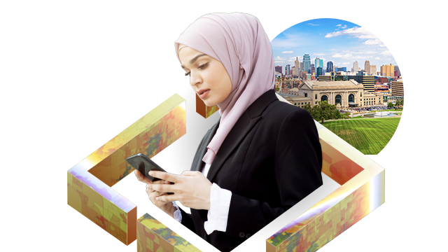 Person wearing a head scarf looking at a mobile device, surrounded by a cityscape and maps Background: