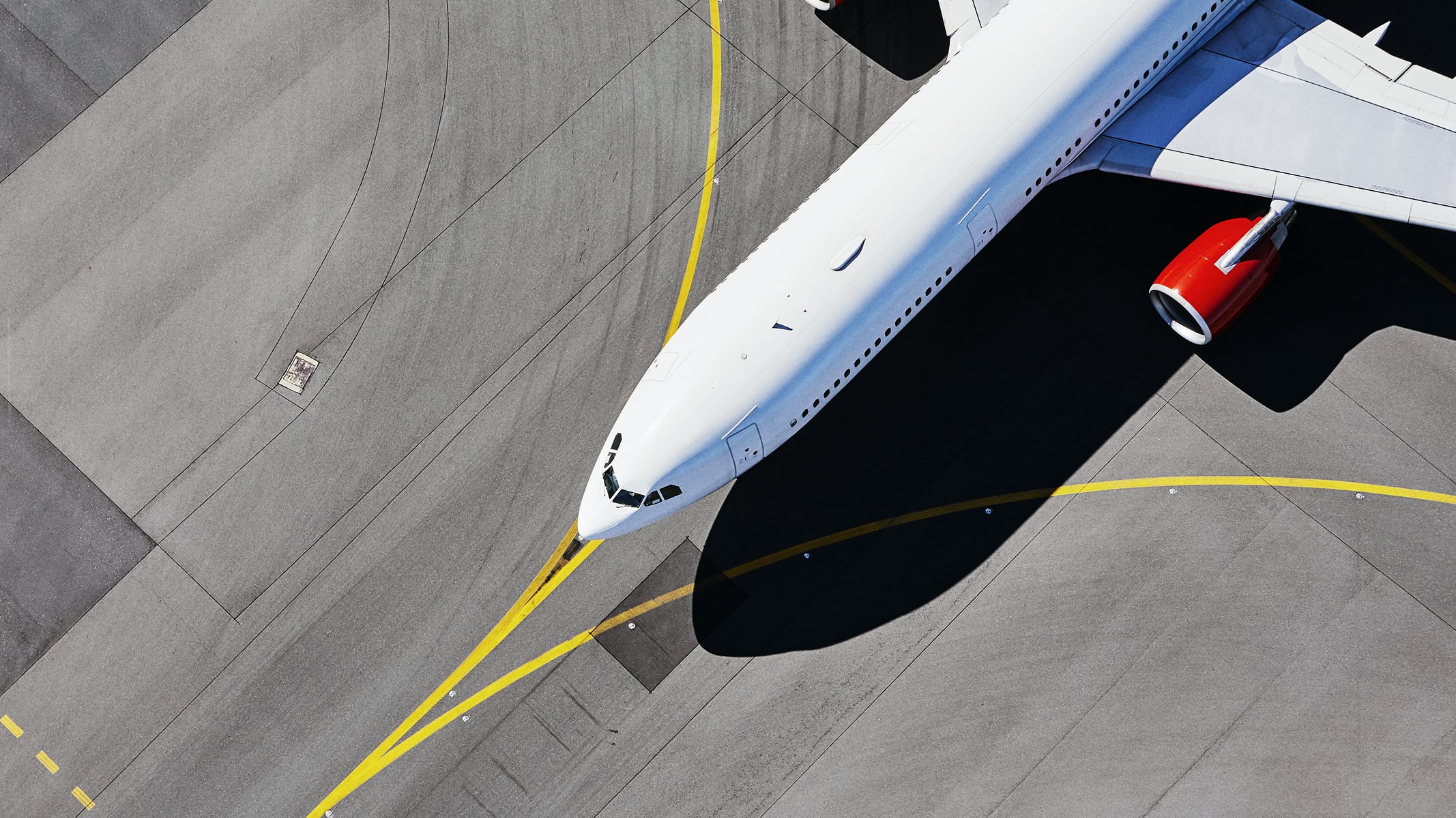 An aerial view of an airplane on the tarmac represents how Dublin Airport transformed operations by unifying its data