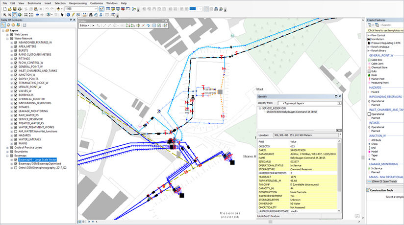 A detailed view of a GIS software interface showcasing utility mapping and network connections.