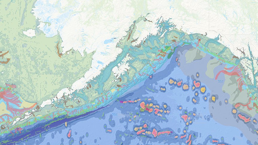 Map of Alaskan Gulf shoreline showing geomorphic zones in red and orange on a blue ocean