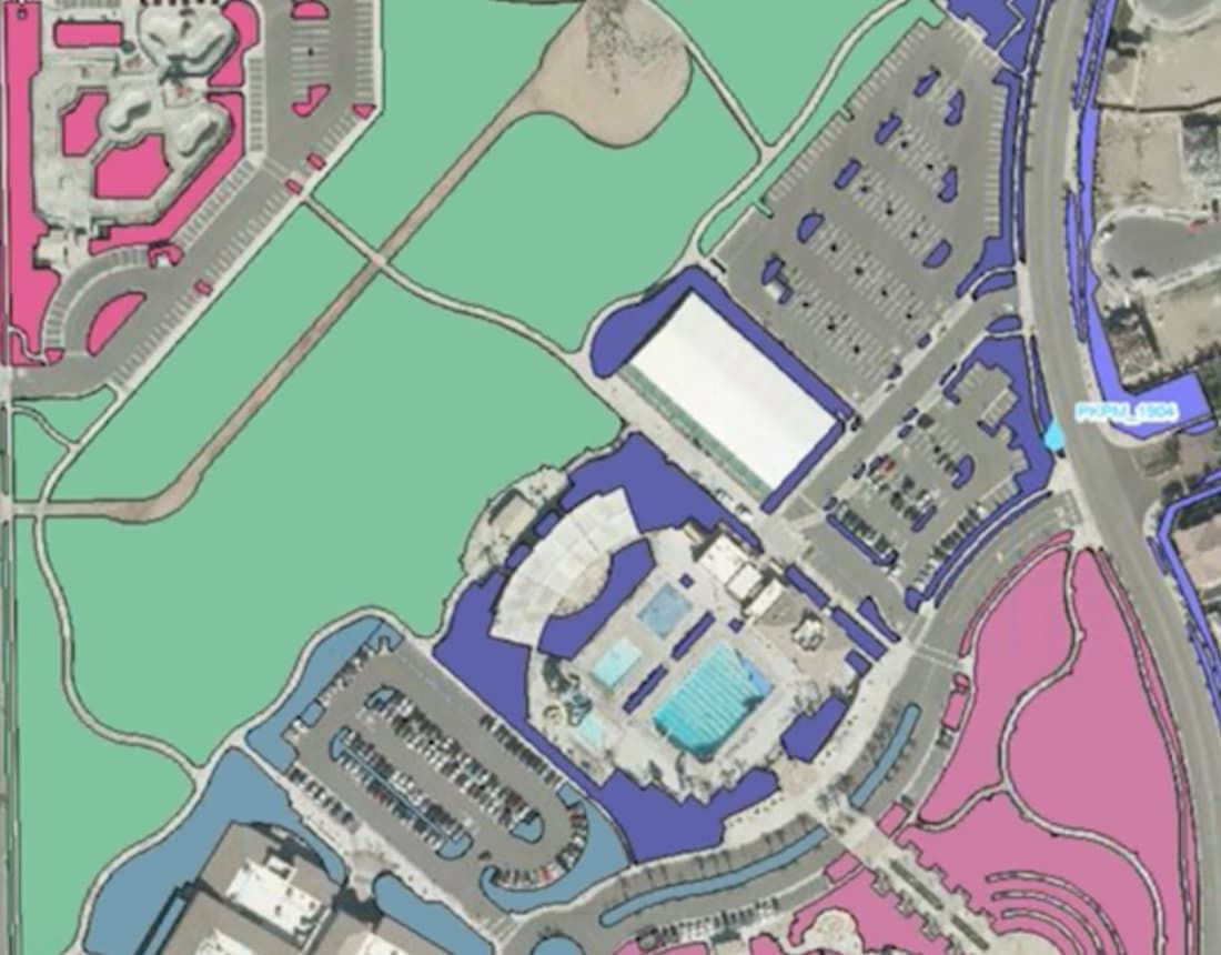 An aerial view showcasing a color-coded map of a large urban area.
