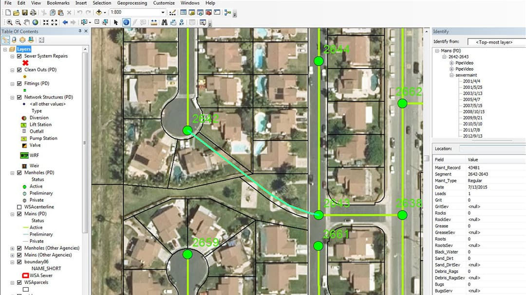 A detailed GIS map showcasing a residential neighborhood layout with visible data points marked in green.