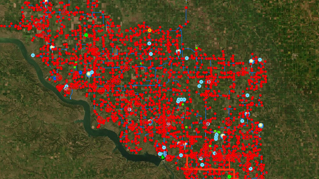 A detailed geospatial map showcasing a large number of red data points distributed across a region. 