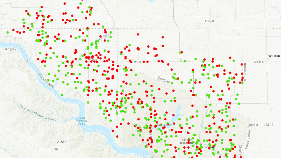 A detailed map showcasing red and green data points distributed across a geographic region. 