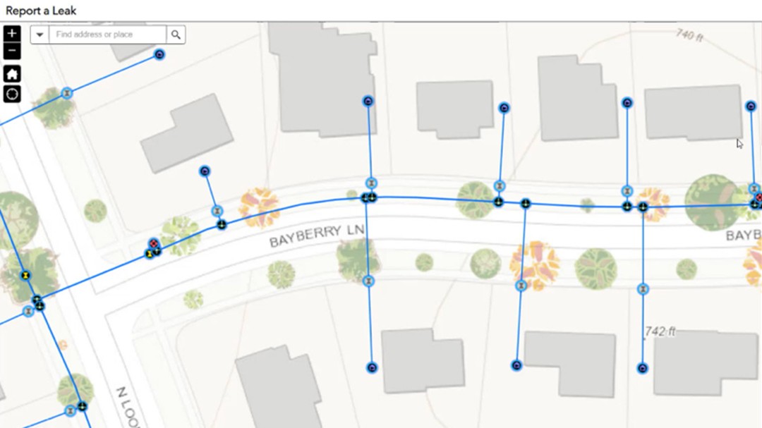 A desktop-based map application is being used by a customer to report a leak in their neighborhood