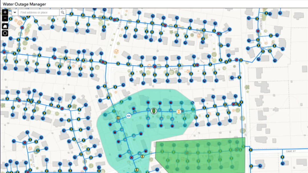 An employee identifies the homes and businesses that will be impacted by a temporary water outage using a web map application