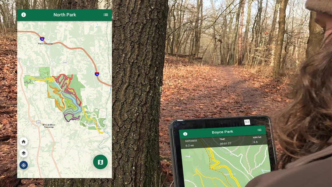 An Allegheny County park ranger uses the Allegheny County Parks Trails app on her mobile device.