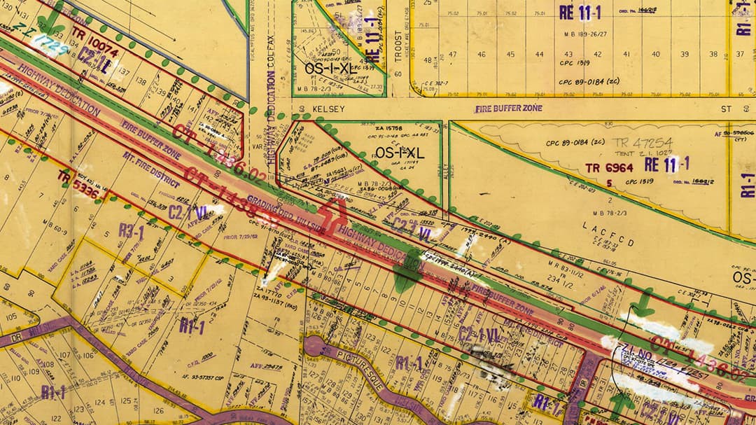 A working map sheet document once used to delineate zoning boundaries   and case annotation before digitization. 