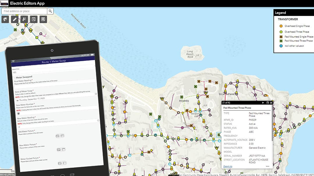 A tablet displays an electric grid management application interface, featuring detailed data and options for monitoring. 