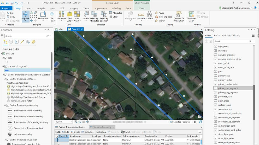 A desktop GIS software interface displaying an aerial map view of a residential area. 