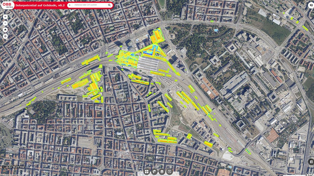 A detailed aerial view of an urban area showcasing solar potential zones marked in bright yellow.