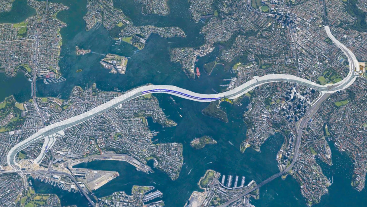 Aerial map of a harbor and surrounding neighborhoods with a proposed transportation corridor crossing the water