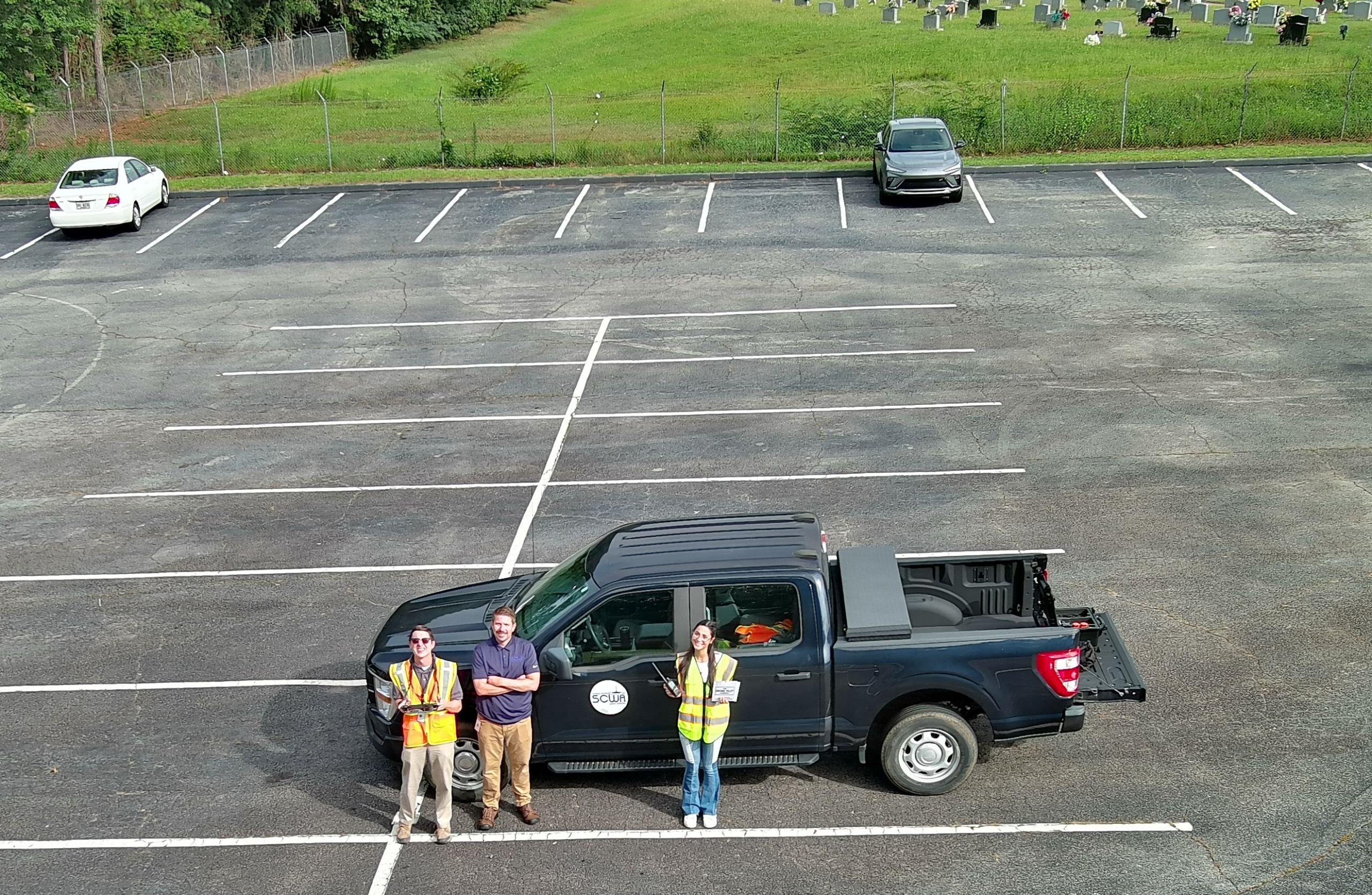 GIS Staff in parking lot, photo taken via drone