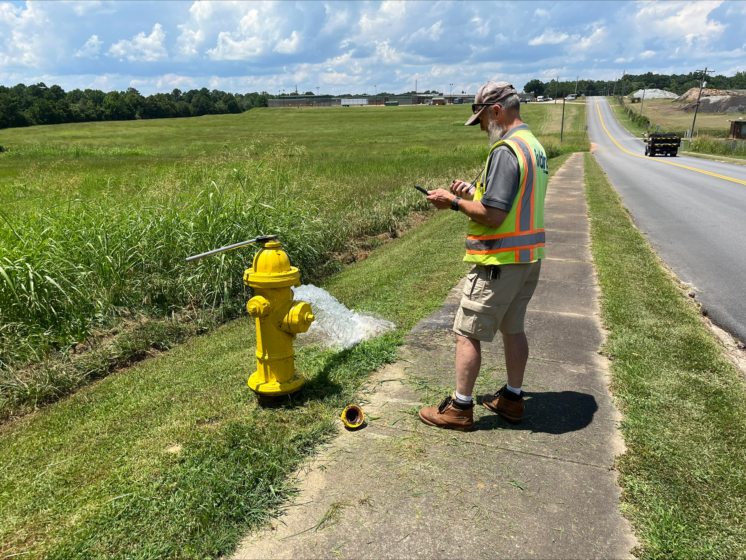 SCWA utility system tech Greg Ballard conducts a routine hydrant inspection, documenting field conditions and collecting information to support accurate infrastructure records and maintenance activities.