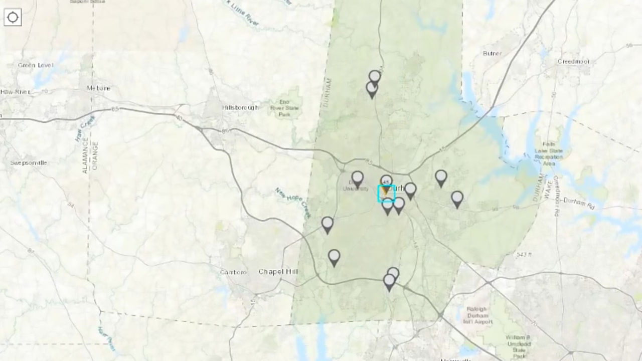 The image shows a digital map interface with a light green highlighted region in the center.