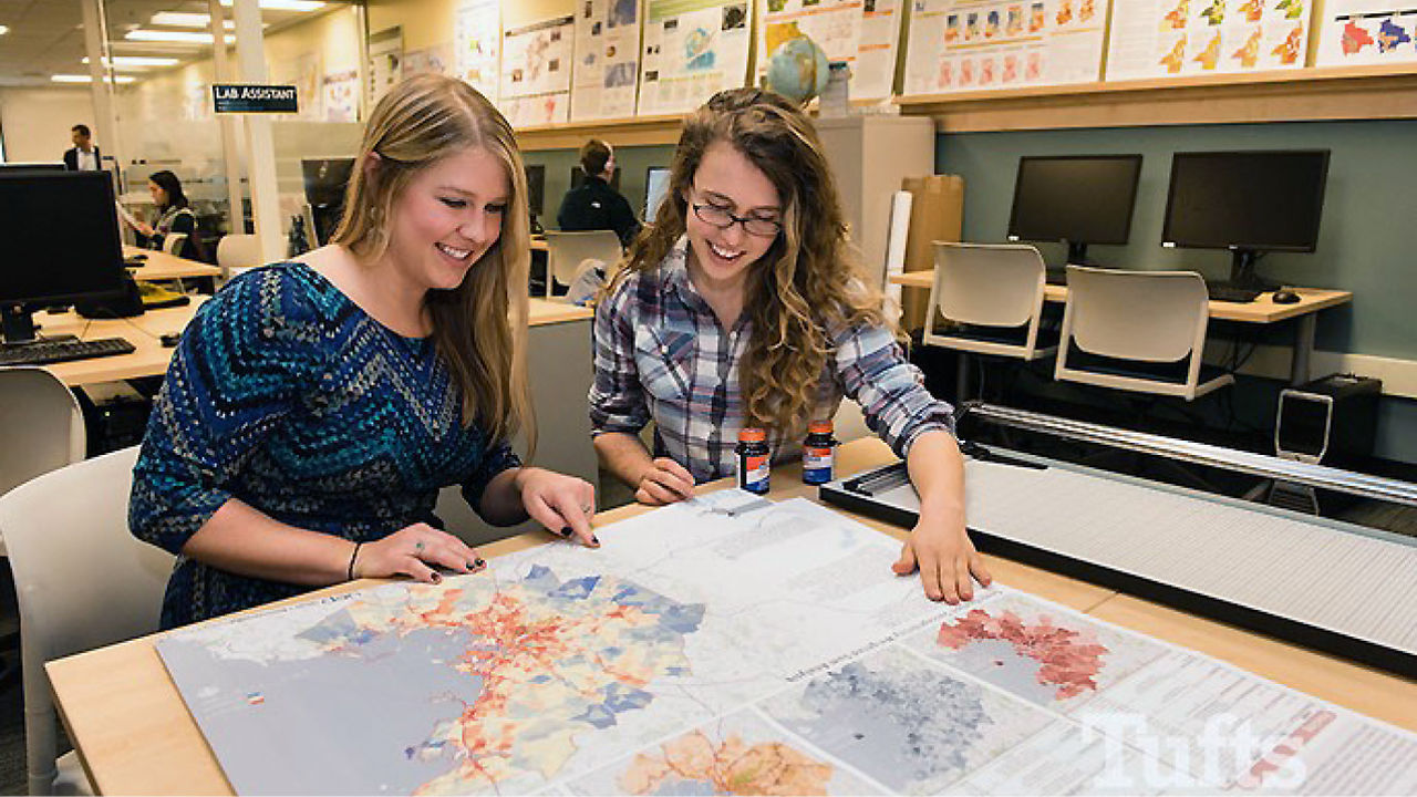 Carolyn Talmadge, Data Lab Services Manager at Tufts University works with a former colleague and lab assistant Madeline Wrable (current ESRI employee). 