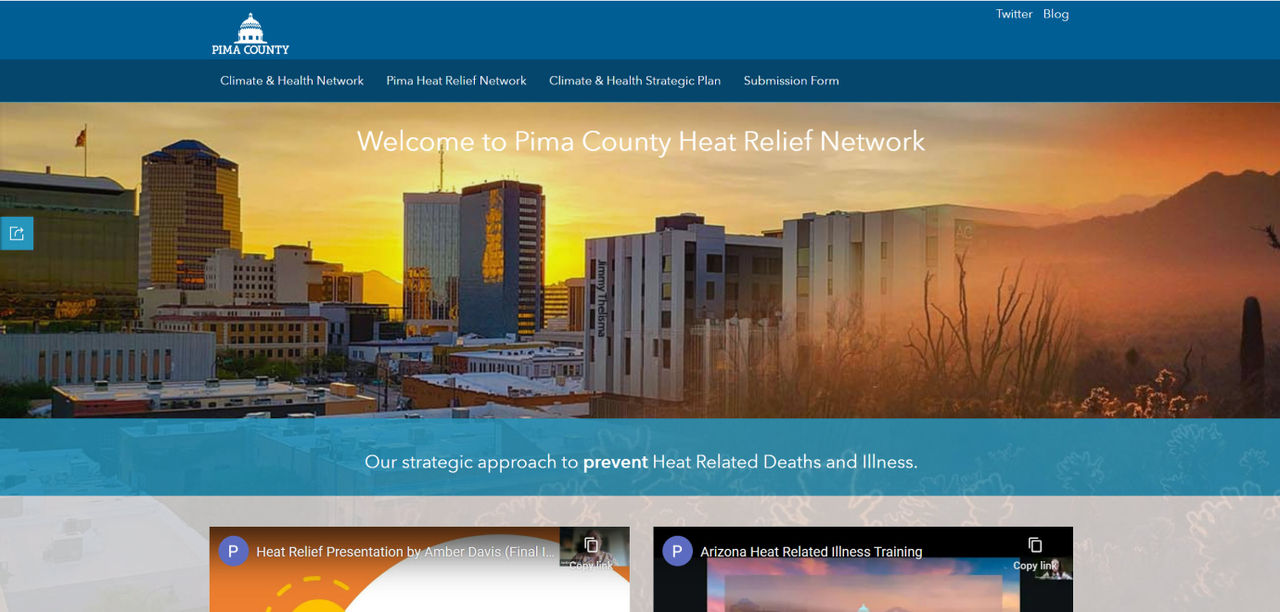 Screen capture of Pima County’s Heat Relief Network website featuring a sunset image of the city
