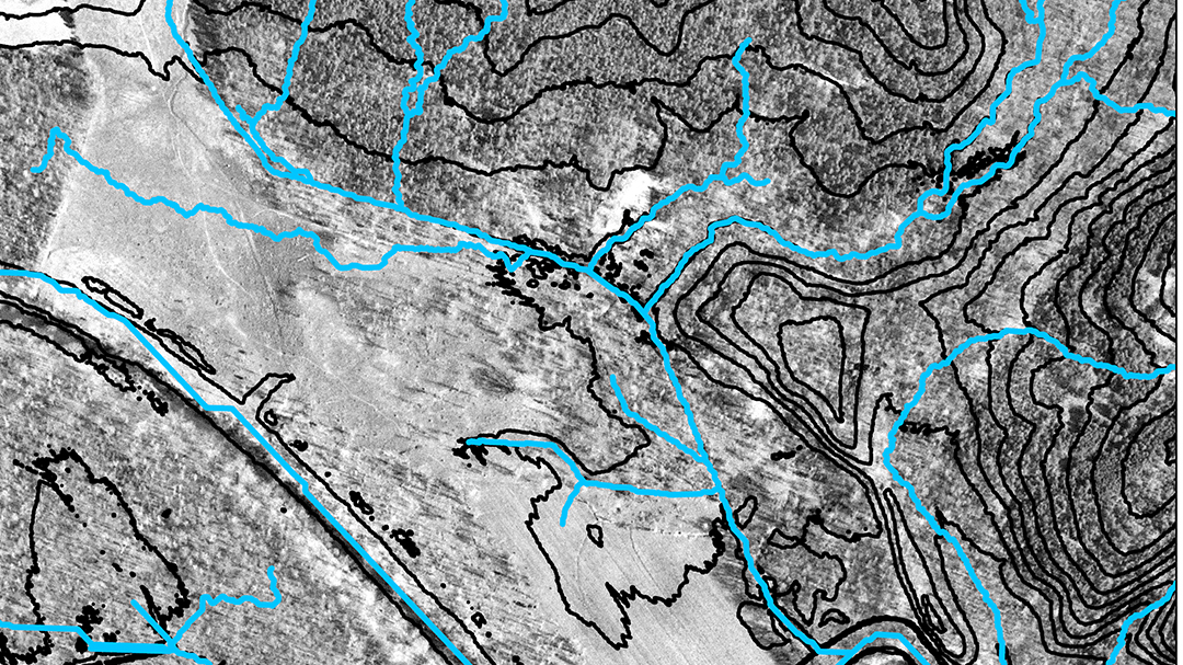 Contours and stream network derived from digital elevation data using ArcGIS Pro tools overlaid on historical aerial photography