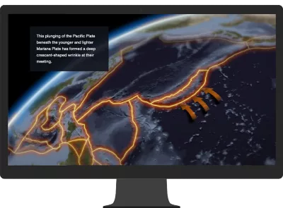 A computer monitor displaying a satellite image of Earth representing an ArcGIS StoryMaps story about the Mariana Trench