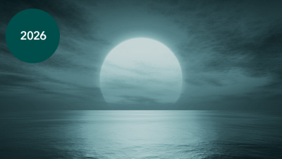 The sun setting over the ocean overlaid with a teal transparency