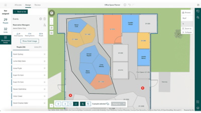 2D color-coded office floor plan showing workspace areas, people, and units.