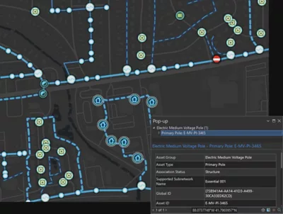 Carte numérique d’un réseau électrique avec une fenêtre contextuelle montrant des données sur un nœud spécifique, qui peuvent être modifiées dans ArcGIS Pro