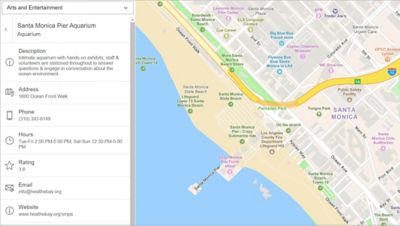 A street map of Santa Monica, California, with a panel showing details for the Santa Monica Pier Aquarium including a description, address, contact information, hours of operation, and a rating 