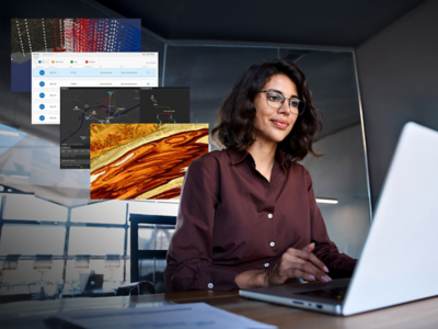 A person using a laptop work with large amounts of spatial data