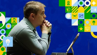 A person seated at a table looking at a laptop against a blue background overlaid with tech-themed icons