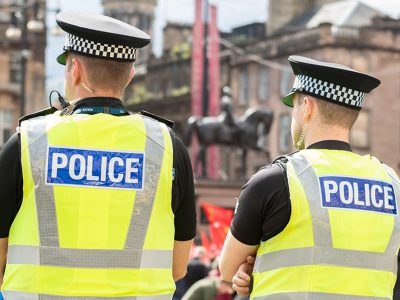 Back view of two police officers