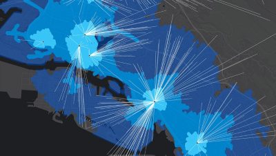 A map shows areas in progressively darker shades of blue, representing a drive time analysis. White lines protrude out of central locations marked by black dots, representing other connections.