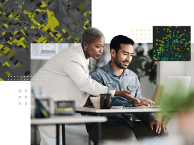 Two professionals collaborating at a laptop, overlaid with abstract maps and spatial data graphics that represent geospatial analysis and strategic decision-making