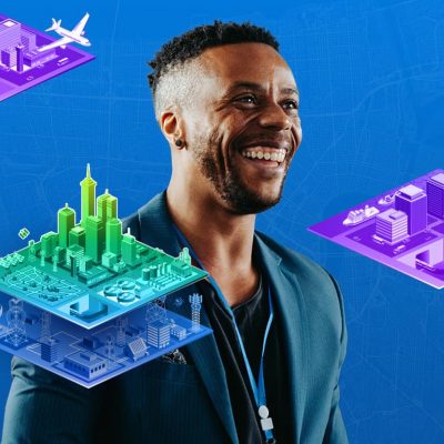 Smiling person wearing a blue blazer looking out of frame overlaid with multi-layered 3D infrastructure model graphics