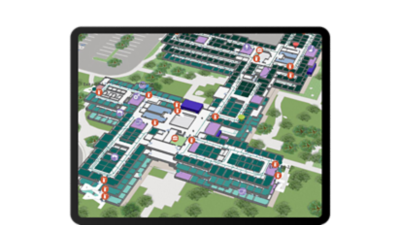 Tablet showing indoor data collection with asset locations on a map of a large office building with red data points