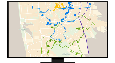 A graphic of a computer monitor displaying a street route map in blue and green on a beige background
