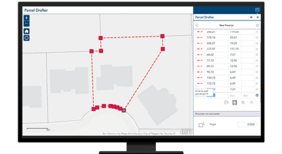 A desktop computer with a parcel drafter map open showing a section outlined in red with red square points