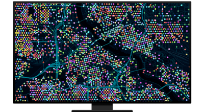 Graphic of a computer monitor displaying a city map with blue streets and many colorful points on a black background