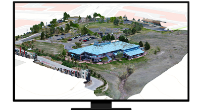 Graphic of a computer monitor displaying a 3D rendering of a potential development on a grassy tree-filled lot