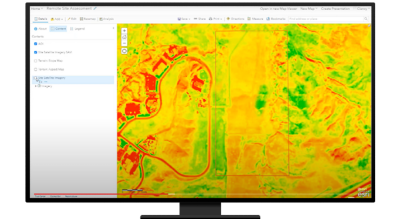 A desktop computer displaying a remote site assessment of a LiDAR map and menu options on the side 