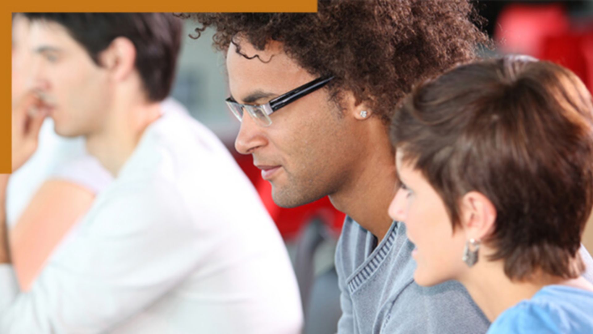 Two people looking in the same direction