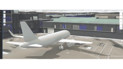 Digital representation of an aircraft next to an airport terminal