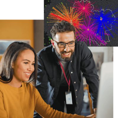 A teacher assisting a student at a computer overlaid with a map displaying many colorful bursts of data