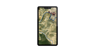 A smart phone showing an aerial view of ground transportation for mining trucks and shows the real-time fleet tracking that helps reduces driving and idle time