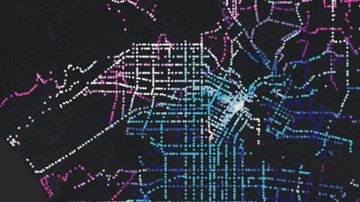 A map of intersecting streets dotted with pink, blue, and purple spots