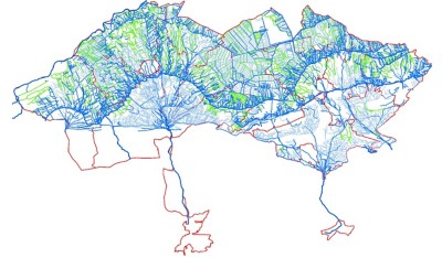 A map with blue, green, and red lines delineates areas within a larger boundary, forming a network across a white background