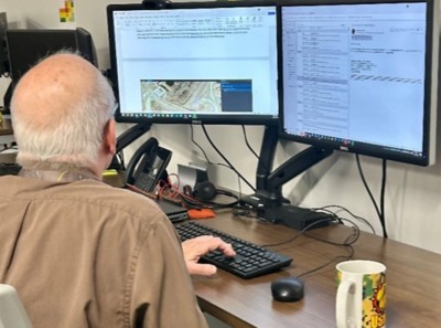 John Kilgore, GIS director for Forsyth County, works on a computer at a desk