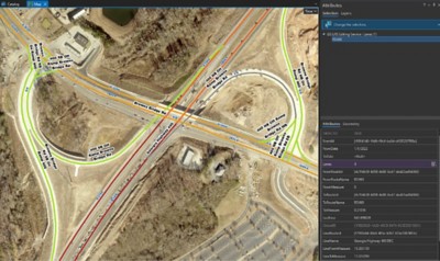 An aerial view of an interconnected roadway system with red and green lines representing a lane count event layer